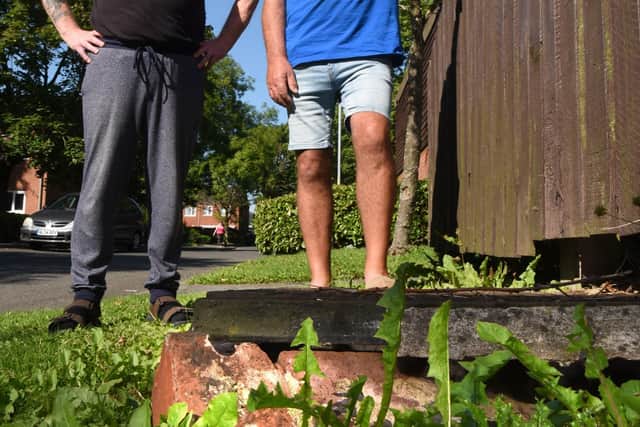 Howard Foreman and Ken Ross, residents of Robin Hey claim Accent Housing are not maintaining the estate properly with rubbish and broken glass being left