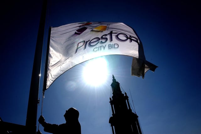 Dawn of a new era... head porter at Preston Town Hall, Geoff Ellison, raises the Preston City Bid - this was way back in the year 2000 - a full two years before Preston finally gained her crown