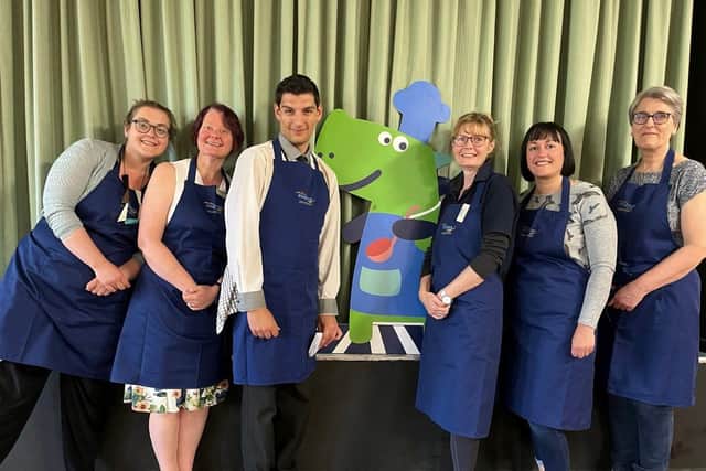Colleagues from Progress Housing Group with the Soup Dragon