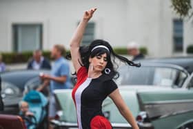 A lady dancing in sixties style clothing at the vintage festival. Picture by Robin Zahler.