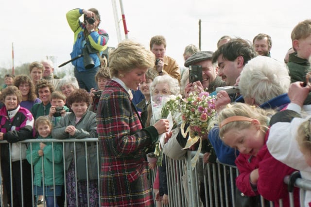Colin Edward gets himself a close-up snap as Princess Diana goes walkabout among the eager crowd in Preston