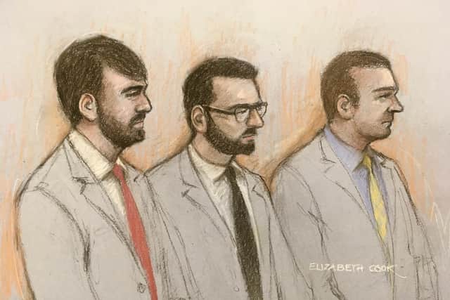 Court artist sketch by Elizabeth Cook of (left to right) serving Metropolitan police officers Pc William Neville, and Jonathon Cobban, along with former police officer Joel Borders appearing in the dock at Westminster Magistrates' Court, in London, charged with sharing "grossly offensive" WhatsApp messages with Sarah Everard murderer Wayne Couzens.