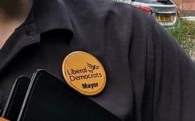 The Lib-Dem Mayor's badge which Coun Darby apologised for wearing when out meeting constituents.