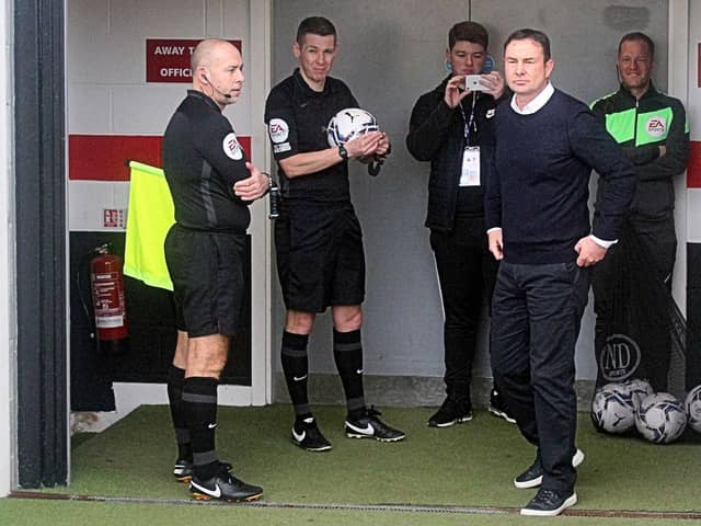 Derek Adams awaits his introduction to the crowd after returning as Morecambe boss last year Picture: Michael Williamson