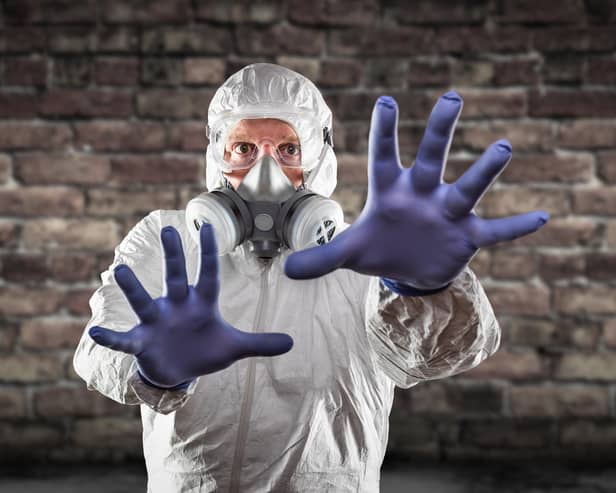 It was like back in the Covid days, suiting up to clear out the loft. Photo: Adobe