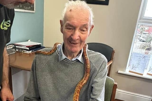 Francis McHugh with a snake.