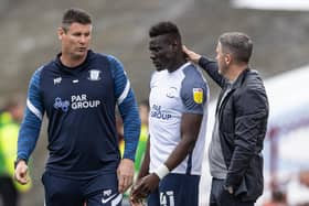 Preston North End defender Bambo Diaby with goalkeeper coach Mike Pollitt (left) and PNE manager Ryan Lowe after the win at Barnsley
