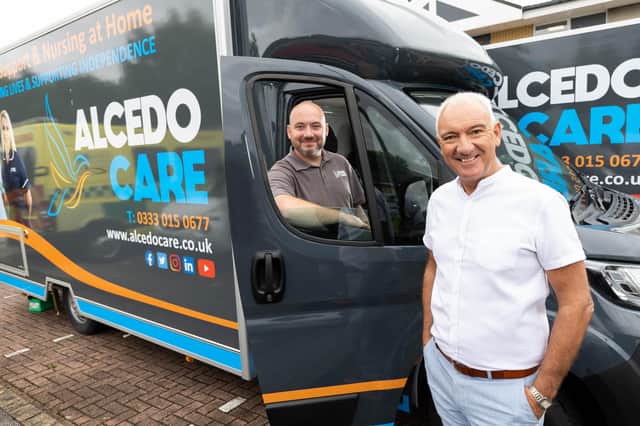 Adam Garvey (left) and John Townley (right) with the new recruitment vehicle bought by Lancashire care specialist Alcedo
