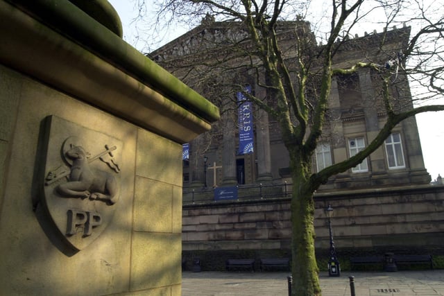 Taking a peek at the Harris Museum and Art Gallery from the Obelisk, displaying a PP badge, on the Flag Market