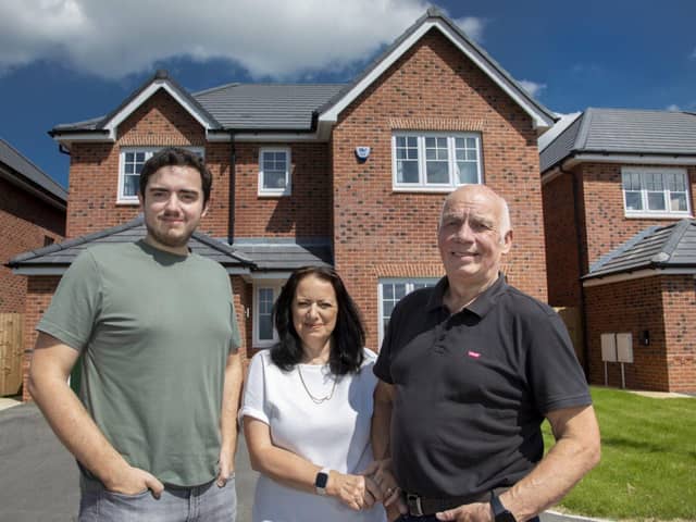 Will Gravner and parents Verity and Colin, pictured outside Will’s new Anwyl home
