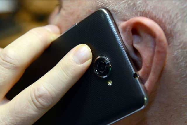 Generic man listening to mobile phone image