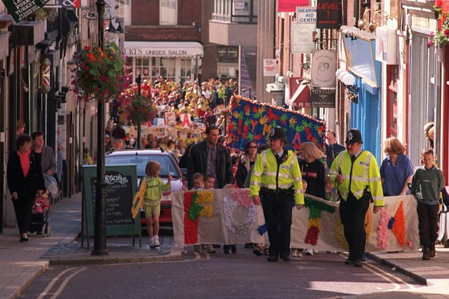 Children march through Preston town centre for a Children's Parade
