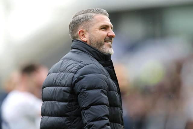 Preston North End manager Ryan Lowe interacts with the fans