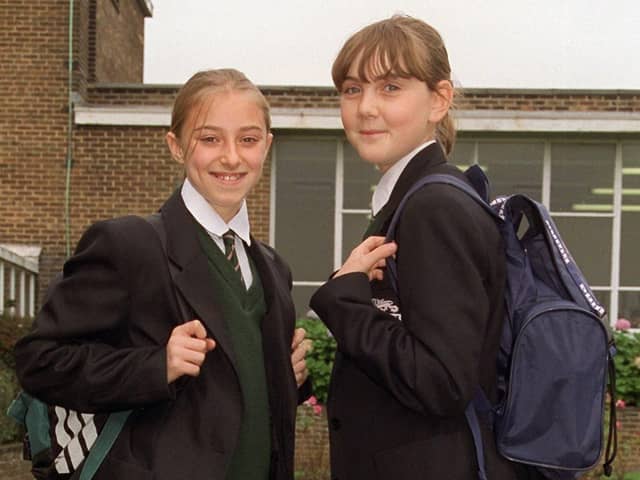 Heidi Mercer (left) and Vicky Williams showing off their bags at Fulwood High School, Preston back in 1998