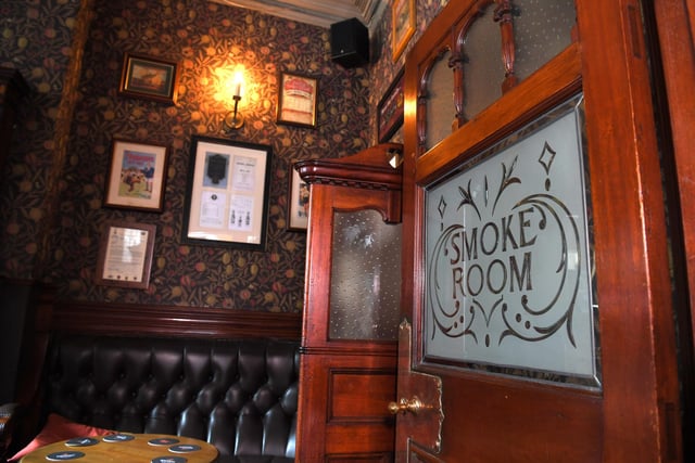 From the Friargate entrance, there is a pair of small smoke rooms, full of original fittings