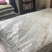 The (correctly-sized) replacement mattress...
