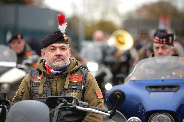 A driver in the vehicle procession