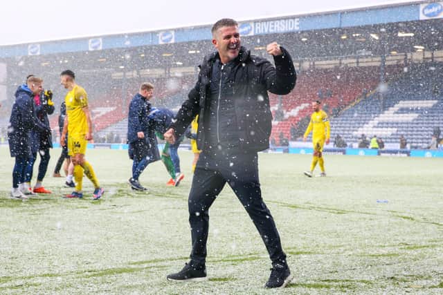 Preston North End manager Ryan Lowe celebrates after the match