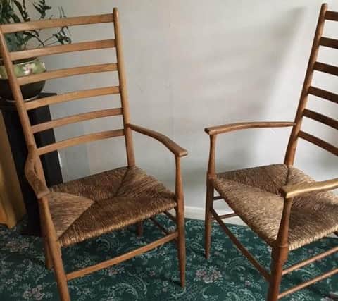 Two of the carver chairs on offer from the set