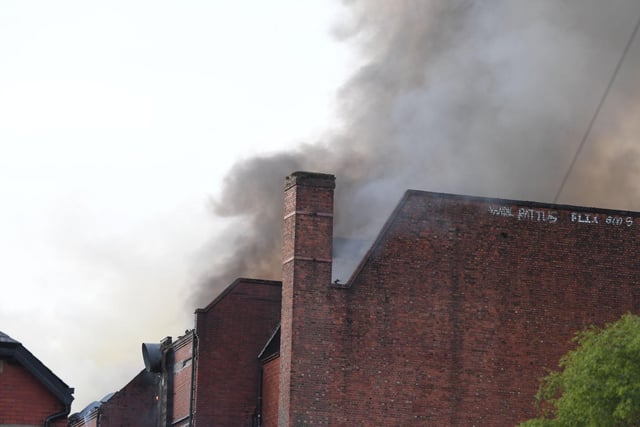 The latest scenes are firefighters battle the blaze.