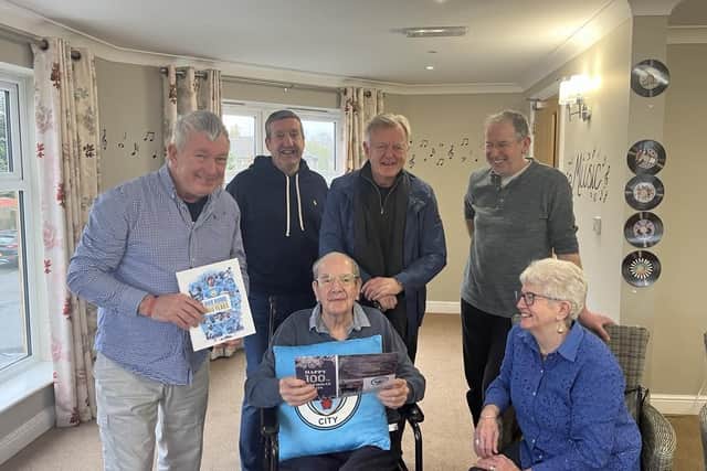 Ex-winger for Manchester City Football Club, Peter Barnes, paid John a visit. A lifelong Manchester City fan, John was ecstatic to see the familiar face. Photo: Ideal Carehomes
