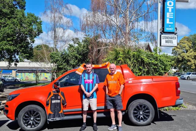 Dave Armistead and son Braedyn are proud to show off their passion forBlackpool in the sunshine of their New Zealand home.