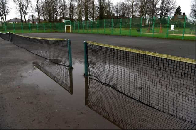 Tennis courts at Haslam Park in need of a facelift.