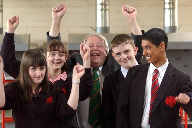 County councillor Alan Whittaker from Lancashire County Council's Education and Cultural Services Directorate celebrates the half a million pound funding that Tulketh High School has received with year nine pupils, from left, Samantha Lee, Natalie Quinn, Daniel Sharples and Paresh Chauhan
