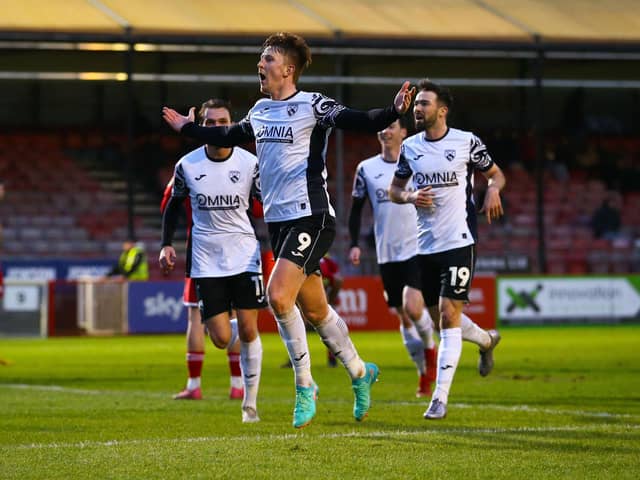 Ged Garner celebrates hitting the winner against Crawley (photo: Morecambe FC)