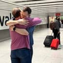 Alex and Patrick meeting for the first time at the airport