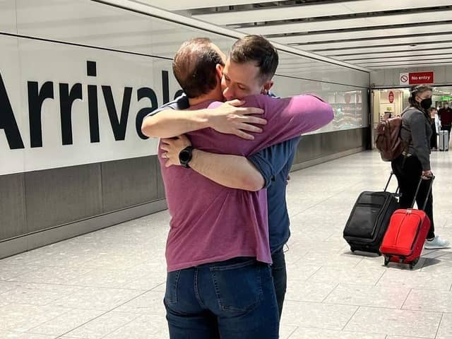 Alex and Patrick meeting for the first time at the airport