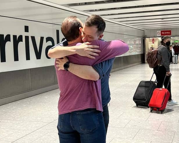 Alex and Patrick meeting for the first time at the airport