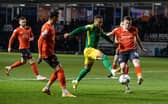 Preston North End's Cameron Archer competing with Luton Town's Reece Burke.