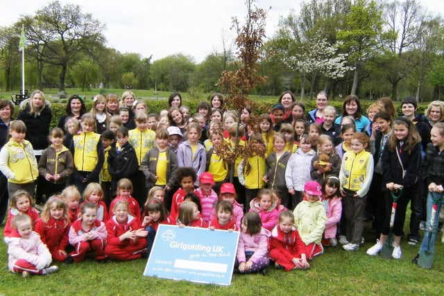 Pictures from Ashton Park district's centenary celebrations on Haslam Park.  Around 100 rainbows, brownies, guides, senior section and leaders met for a Picnic on the Park and planted a tree to celebrate 100 years of guiding in Ashton