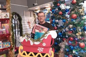 Depher founder James Anderson will spend two days handing out free Christmas presents to children in Burnley next month