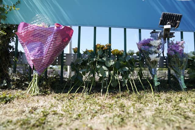 Flowers are left outside Liquid Leisure in Windsor, following the death of an 11-year-old girl
