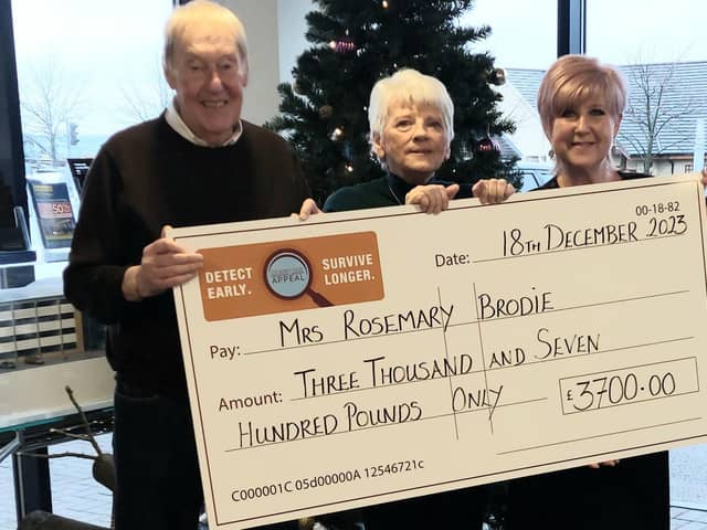 Rosemary Brodie, the winner of the Barry Kilby Prostate Cancer Appeal lottery, pictured with Barry Kilby and Janet  Ryan-Smith who is the project manager and test day co-ordinator.