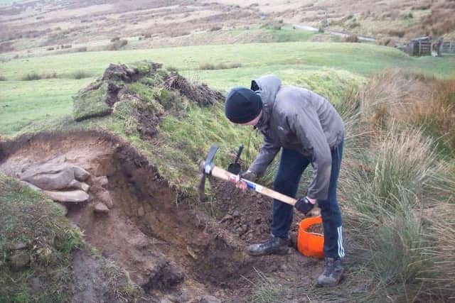 Excavating on Calf Hill near Sabden during a Discover Archaeology dig