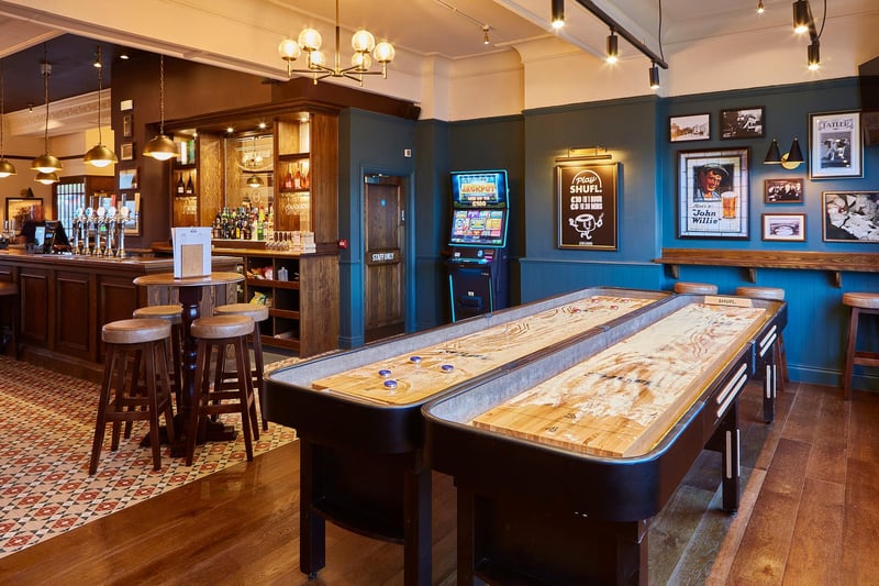 The spacious interior complete with some shuffleboards.