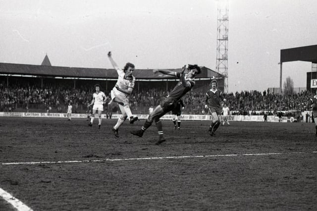 Alex Bruce was a cult figure at Preston North End and enjoyed two stints with the club. In a total of 363 appearances he found the net 157 times. He is pictured here volleying home against Leicester at Deepdale in April 1979