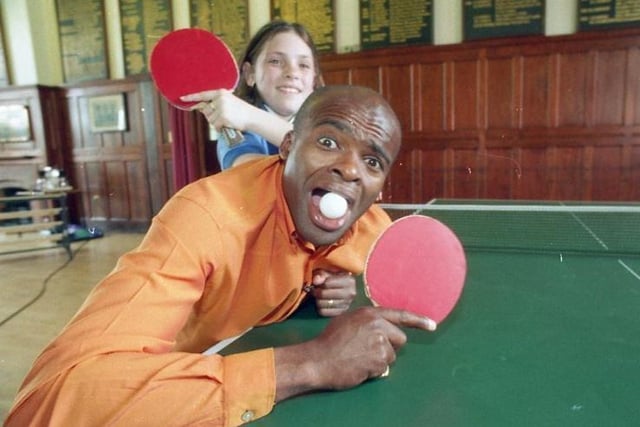 Champion hurdler Kriss Akabussi had a few obstacles to overcome when he rain into Preston's schoolgirl table tennis ace Katy Parker. The former Olympian turned TV presenter put in a star appearance at Kirkham Grammar School's sports day after playing a game of table tennis with pupil Katy and her mum, former Commonwealth player Jill Hammersley Parker, for the Record Breakers television programme