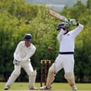 Vernon Carus batsman and skipper Wes Royle, right