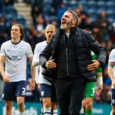 Preston North End manager Ryan Lowe celebrates with fans at the final whistle