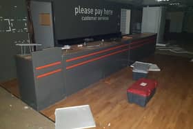 Boxes, allegedly containing snails, stand where shoppers would once have queued at the till (image: Blog Preston)
