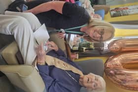 Helen McVey, who is chief executive of Pendleside Hospice, congratulates Dorothy Woodhead on her 100th birthday. Dorothy was one of the 'Crowther Street Mob' who helped to raise £100,000 to make the hospice become a reality in 1988