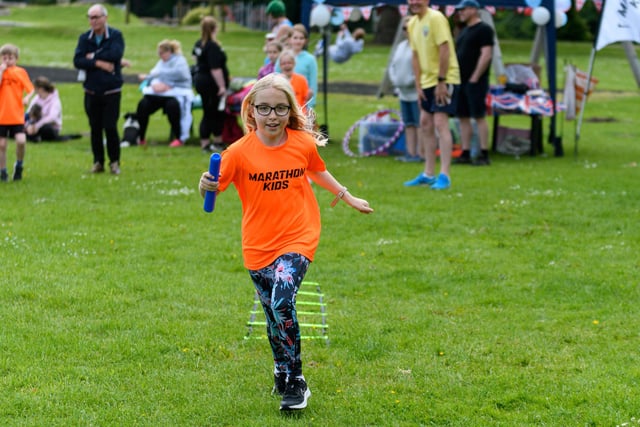 Marathon Kids took part in games as they warmed up for their run