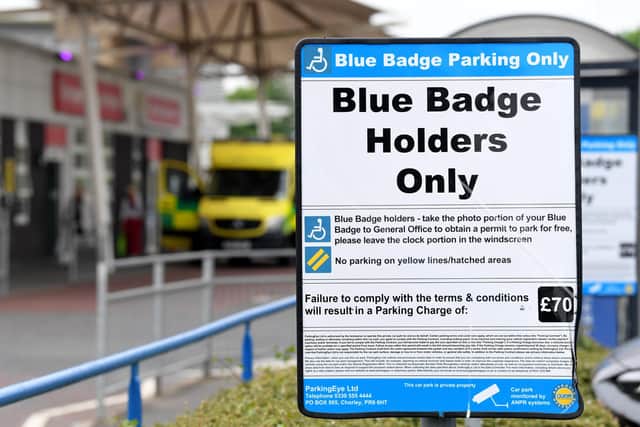 The Royal Preston is reviewing its signage amid concern over potential confusion about whether choosing to pay for parking negates the need for blue badge-holders to register their vehicles - it doesn't