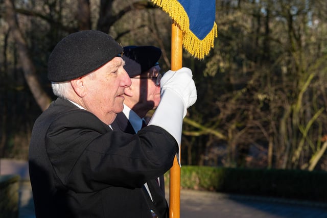 Military standards were displayed at the annual service to remember victims of Holocaust and Genocide in Astley Park. Photo: Kelvin Stuttard