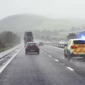 Lancashire Police said officers were preparing to lift a closure on the M6 near Lancaster when an HGV collided with a pedestrian in the carriageway just after junction 33. The man suffered a leg injury and was taken to hospital for treatment