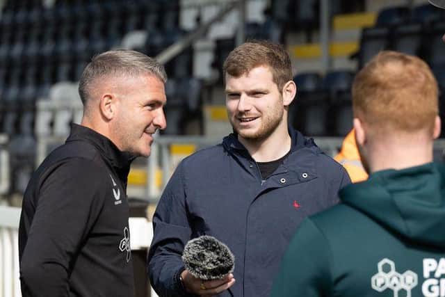 Tom Sandells conducts a post match interview with Ryan Lowe at Bamber Bridge. Credit: PNEFC/Ian Robinson